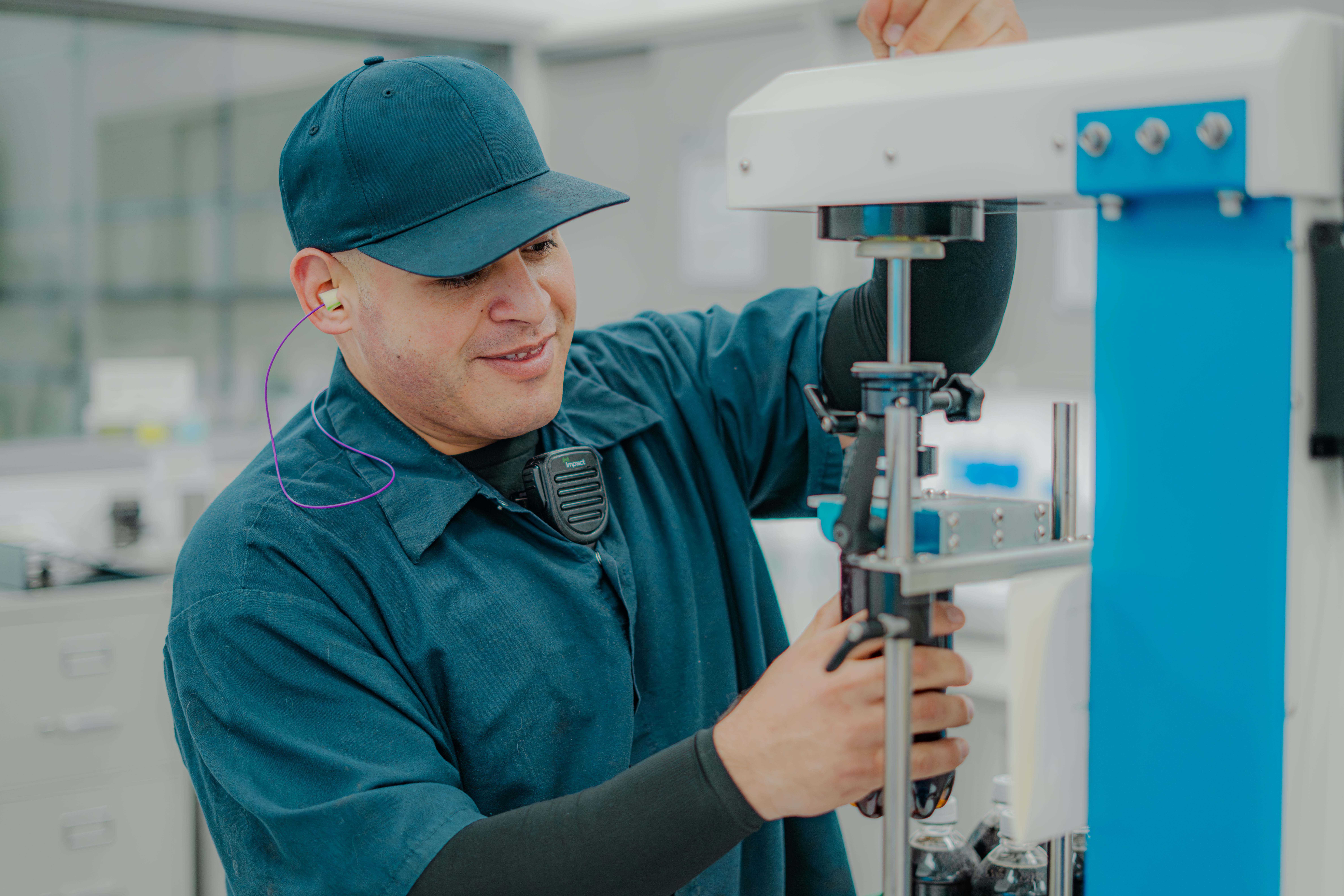 Person in laboratory testing product for quality assurance